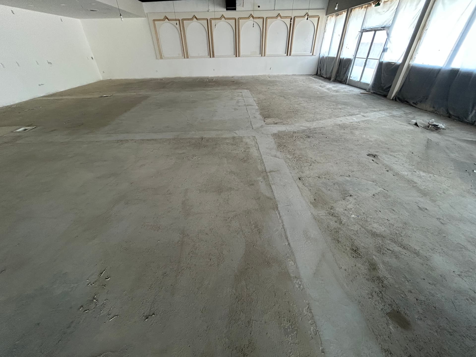 Gallery photos for Coffee Shop Floor Prep Done Right with Concrete Grinding and Self Leveler: Image #6