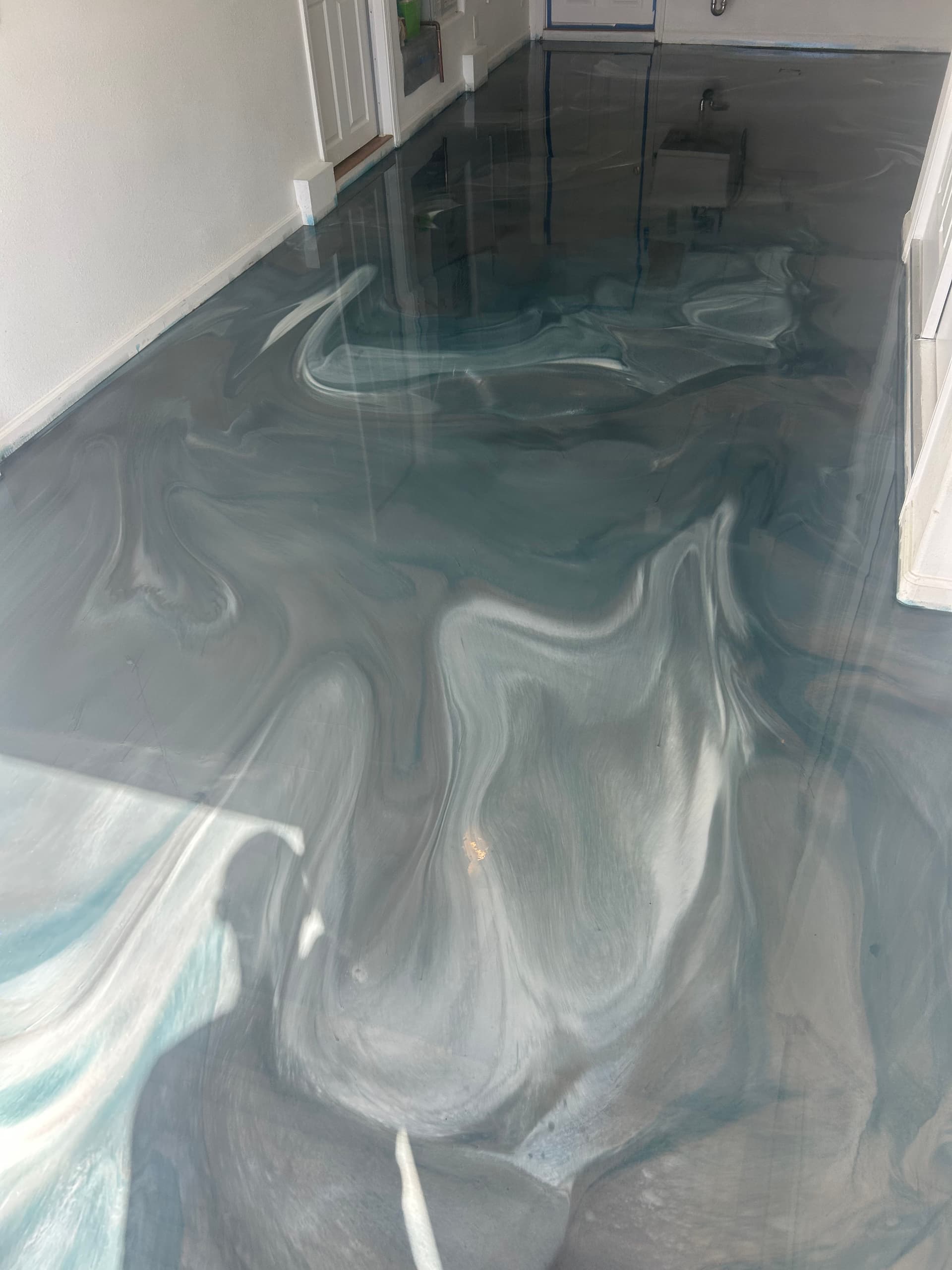 Gallery photos for Single Car Garage Gets a Stunning Metallic Epoxy Floor: Image #4