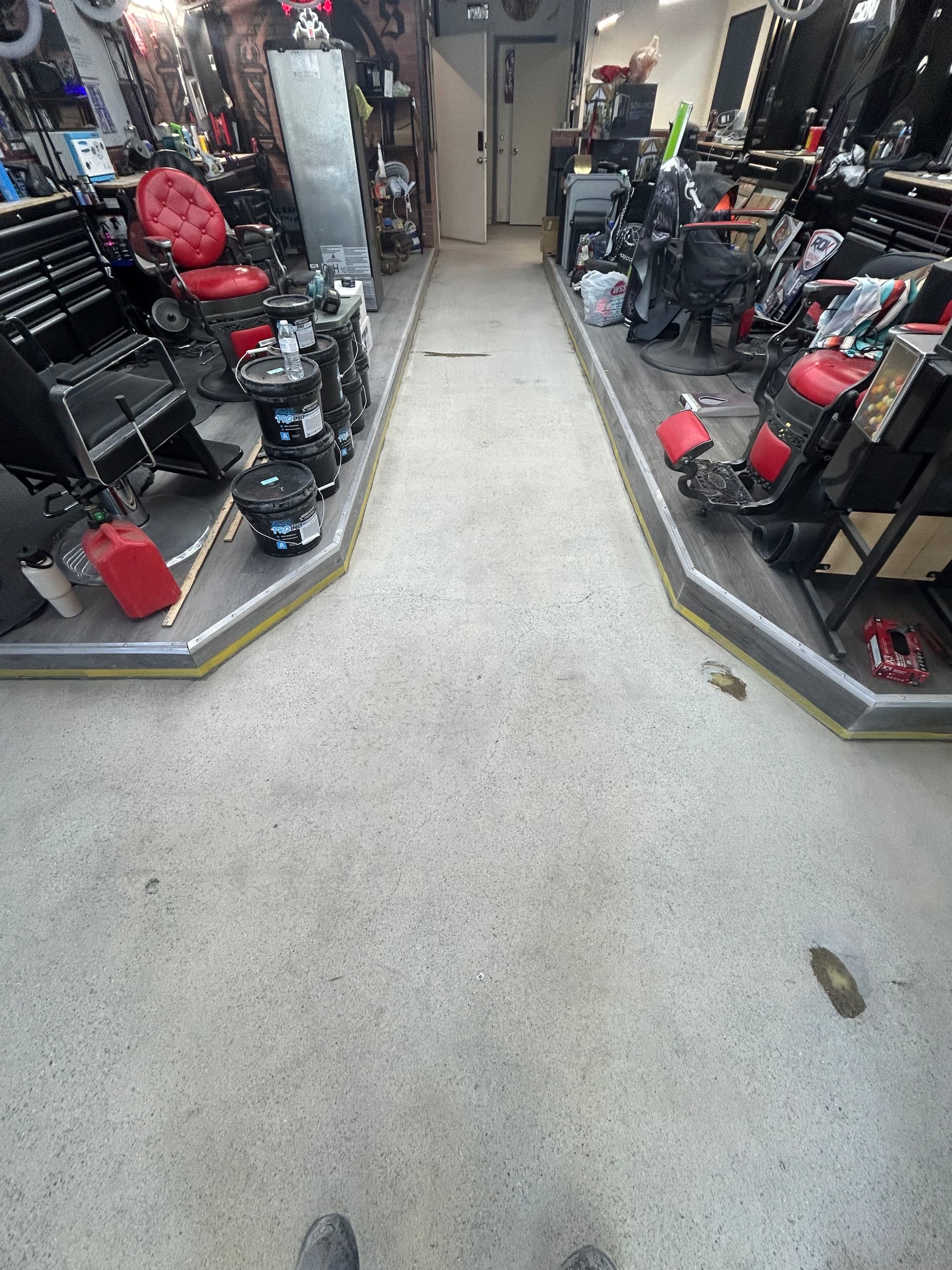 Gallery photos for Cracked Concrete to High-Gloss Black Epoxy in a Commercial Space: Image #2