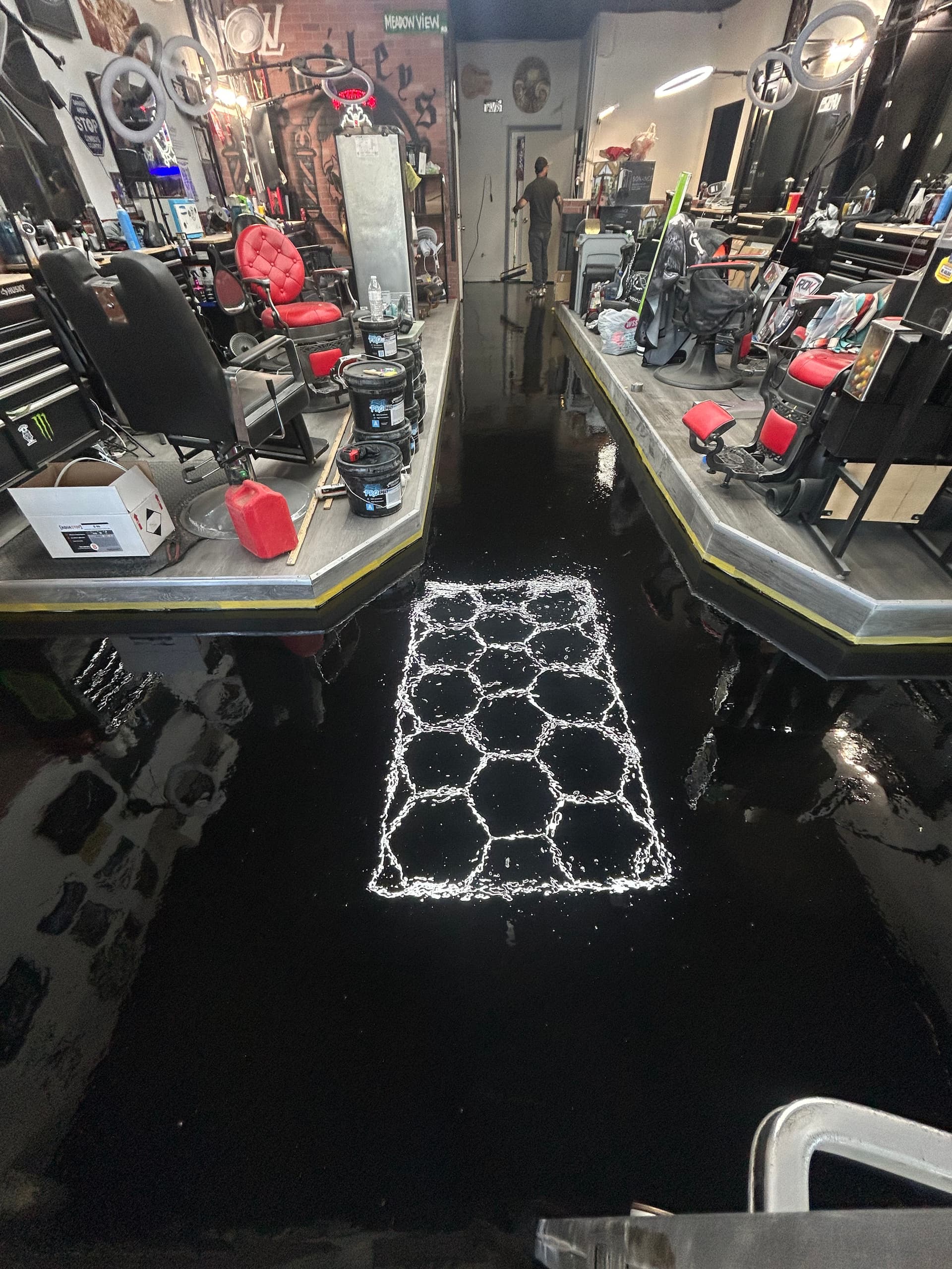 Gallery photos for Cracked Concrete to High-Gloss Black Epoxy in a Commercial Space: Image #6