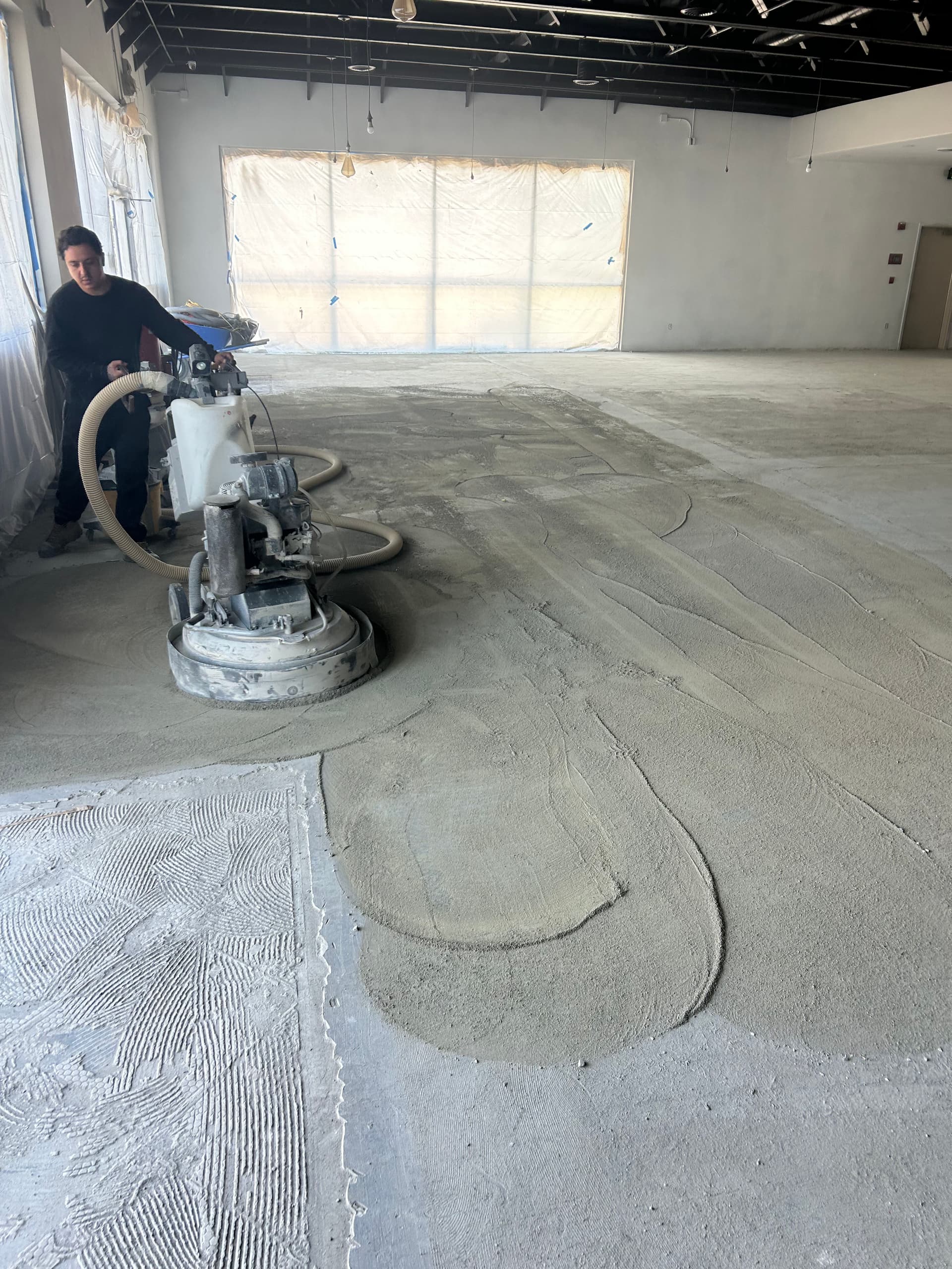 Gallery photos for Coffee Shop Floor Prep Done Right with Concrete Grinding and Self Leveler: Image #4