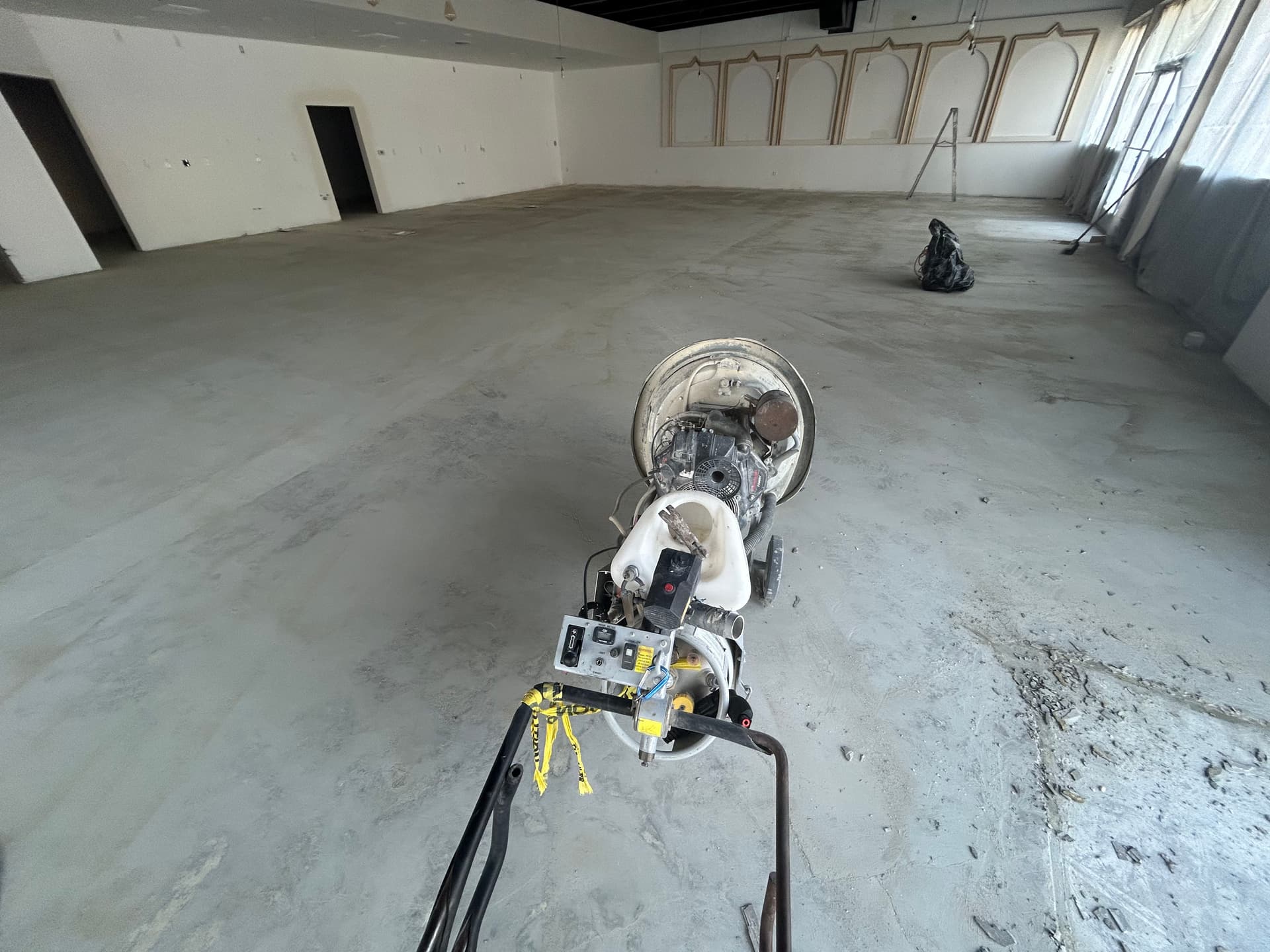 Coffee Shop Floor Prep Done Right with Concrete Grinding and Self Leveler image