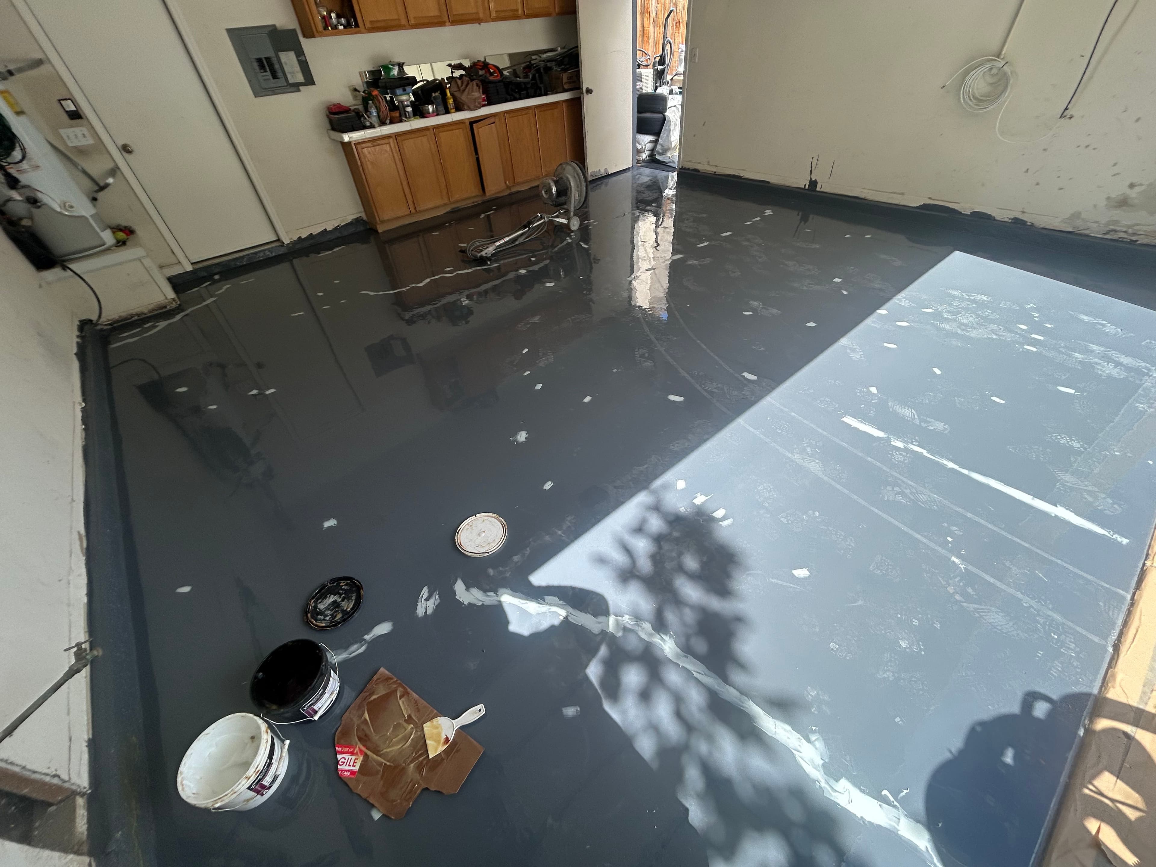 Project Plain Concrete Garage Gets a High-Gloss Metallic Epoxy Floor image