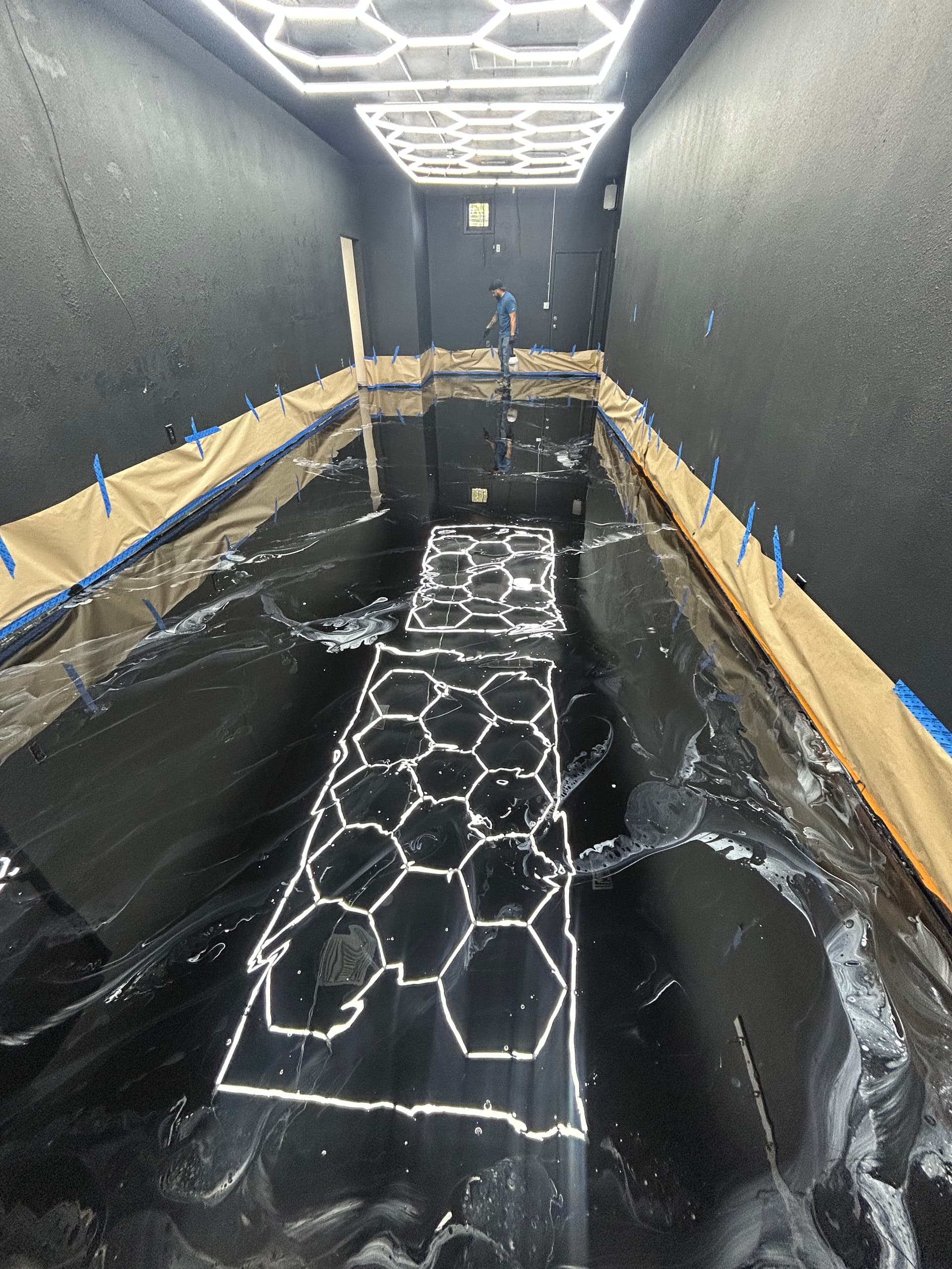 Gallery photos for Cracked Concrete to High-Gloss Black Epoxy in a Commercial Space: Image #8