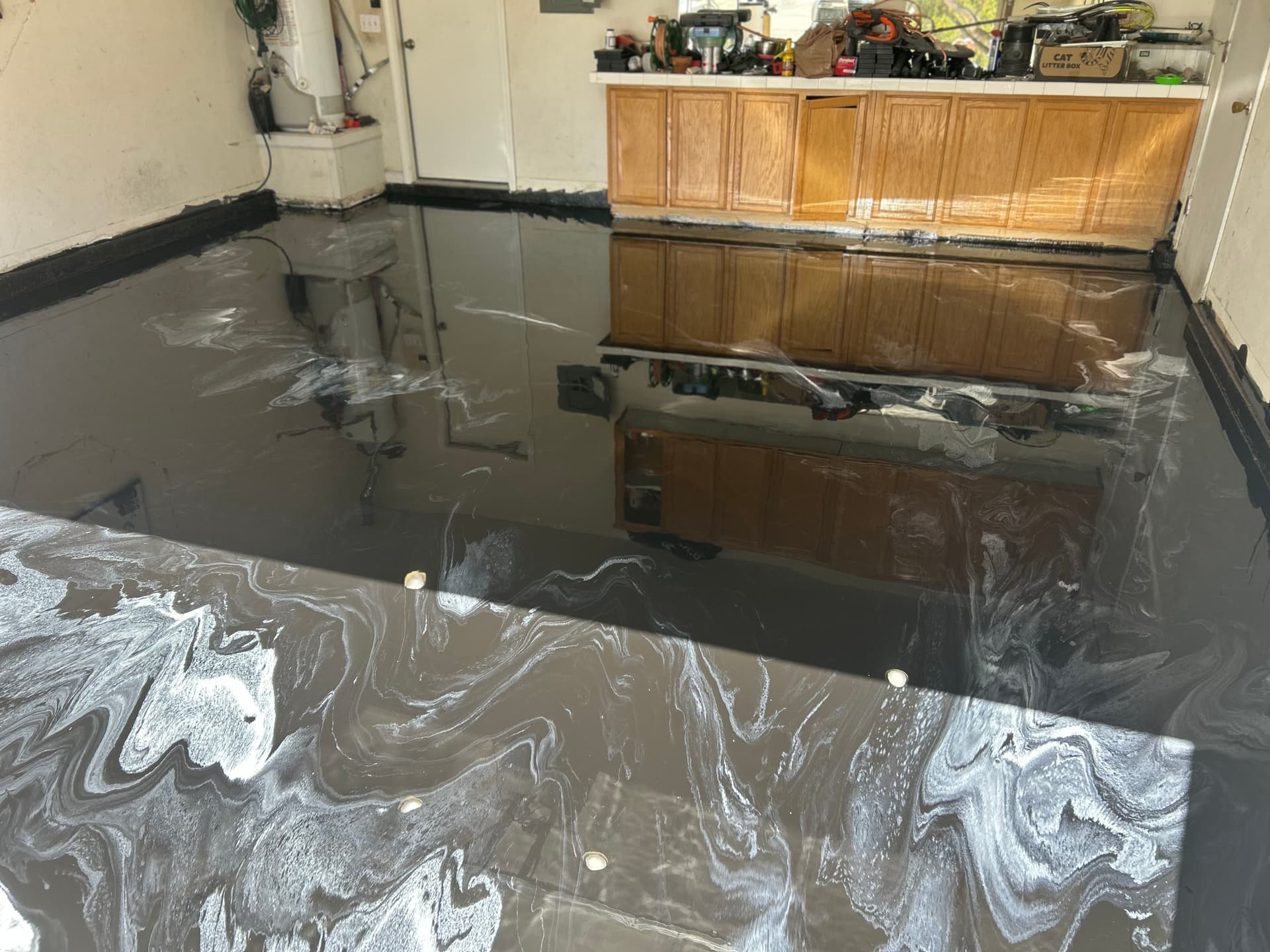Gallery photos for Black Metallic Epoxy Garage Floor That Stops You in Your Tracks: Image #9