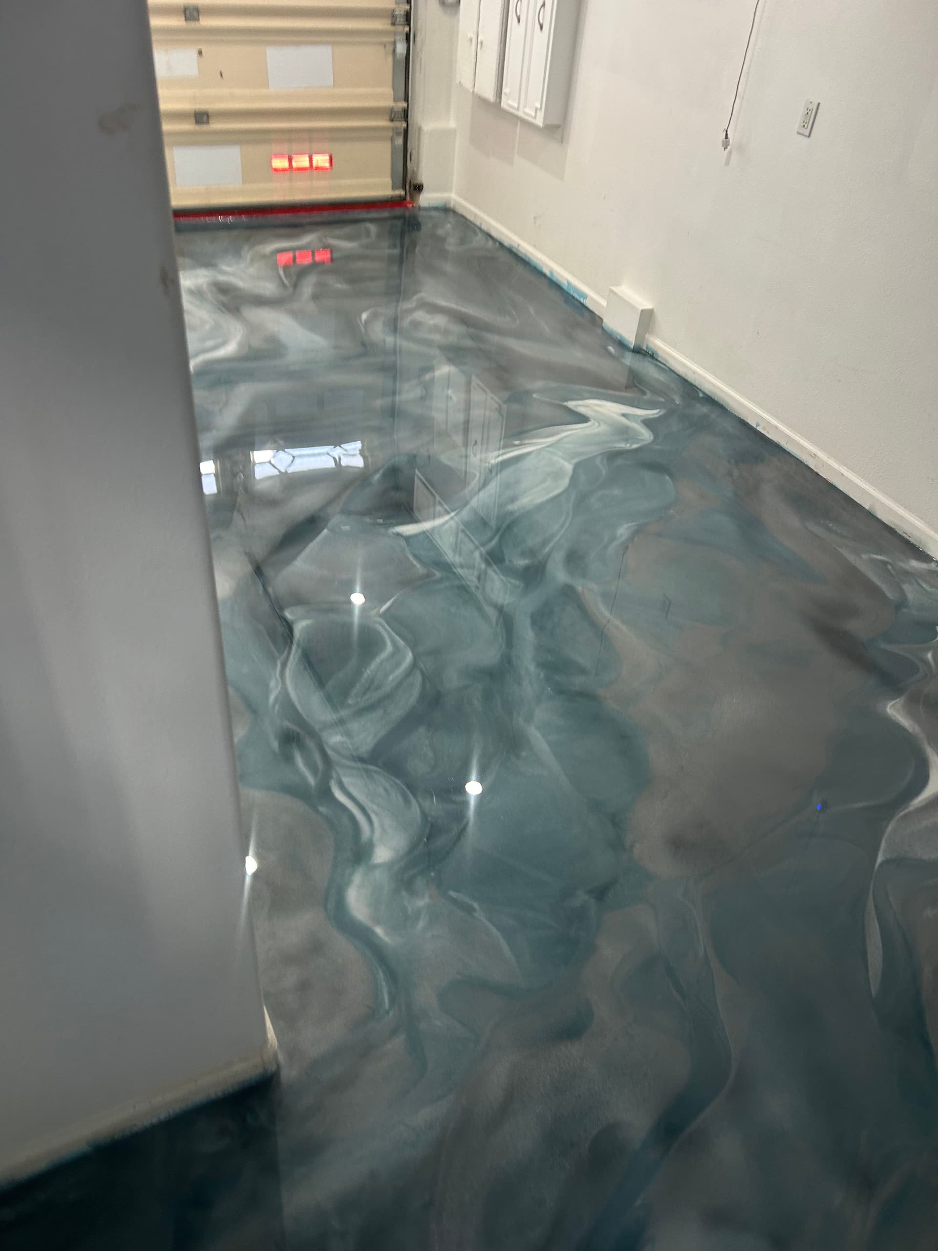 Gallery photos for Metallic Epoxy Garage Floor That Actually Stops People in Their Tracks: Image #4