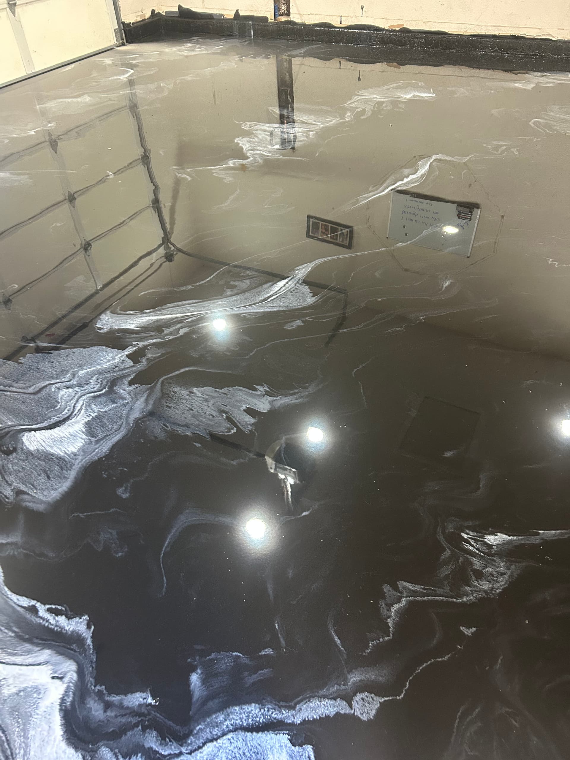 Gallery photos for Black Metallic Epoxy Garage Floor That Stops You in Your Tracks: Image #4