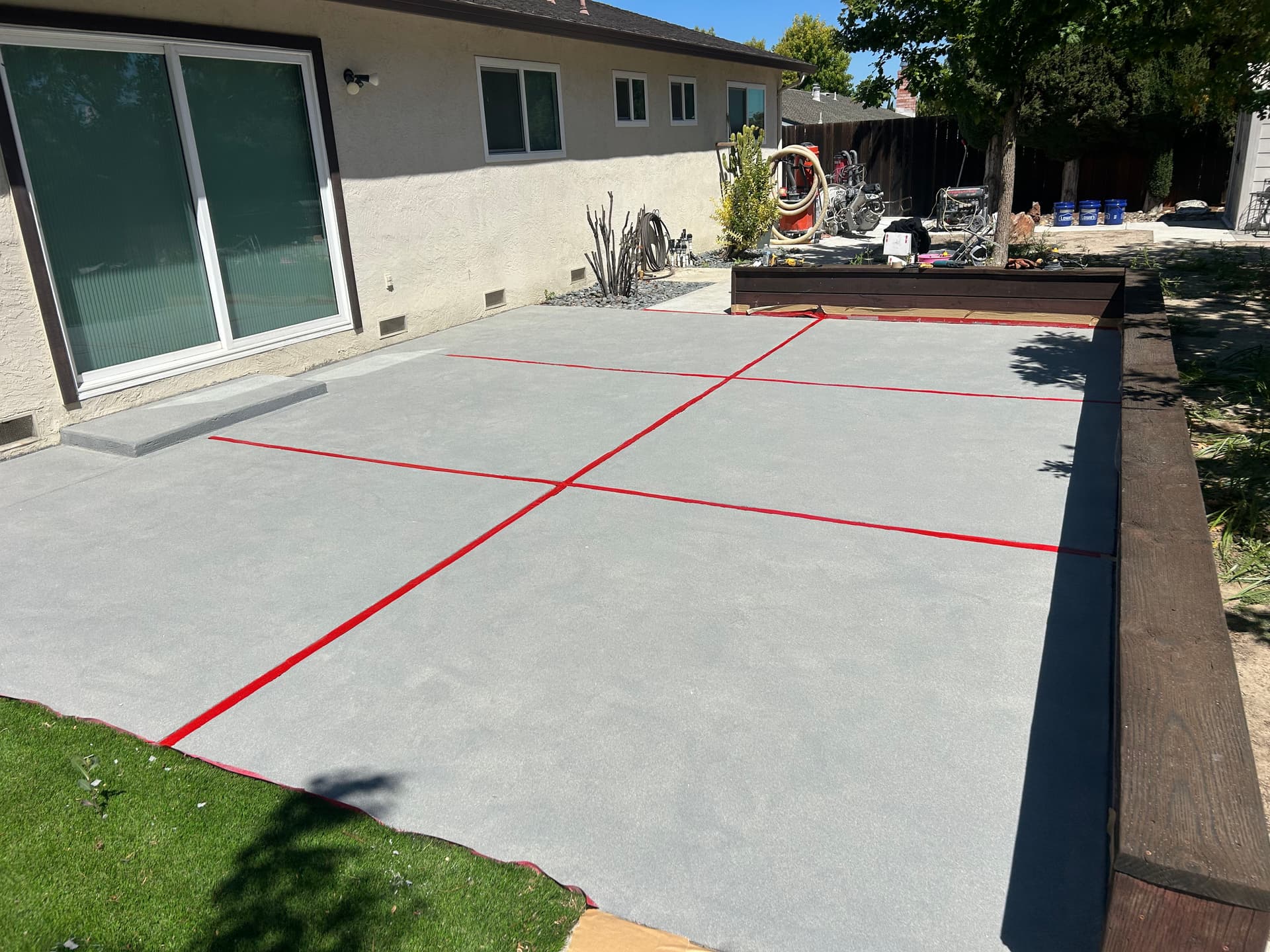Gallery photos for Backyard Patio Gets a Sand Coating Epoxy and Poly Double Broadcast Finish: Image #7