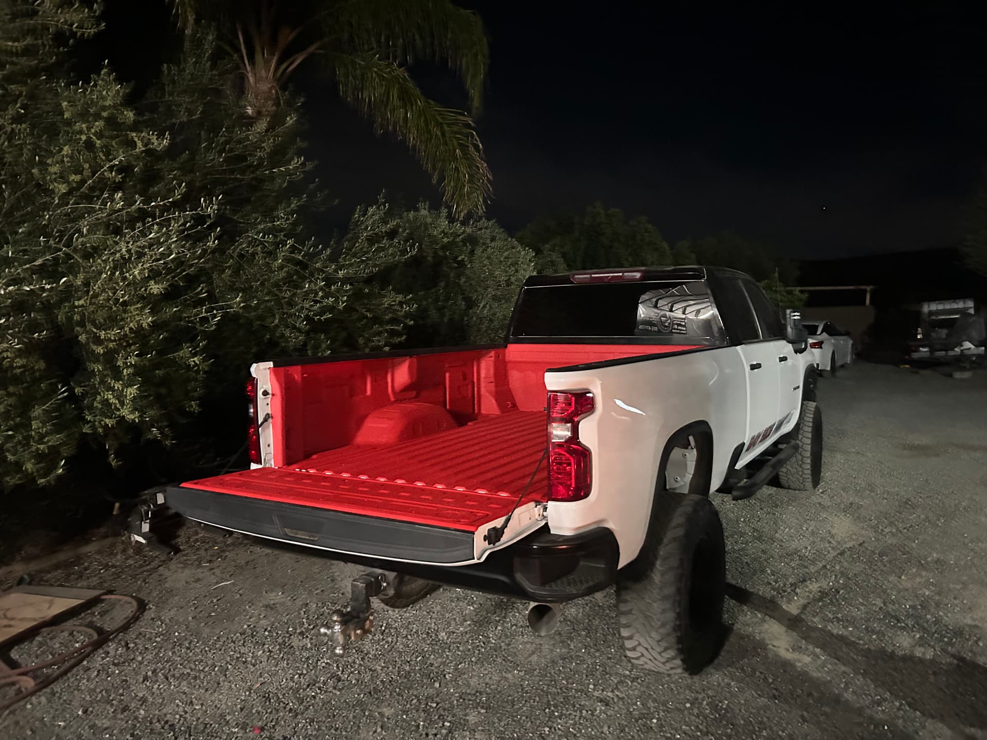 Gallery photos for Custom Red Pigmented Bedliner on a Chevy 2500 HD: Image #4