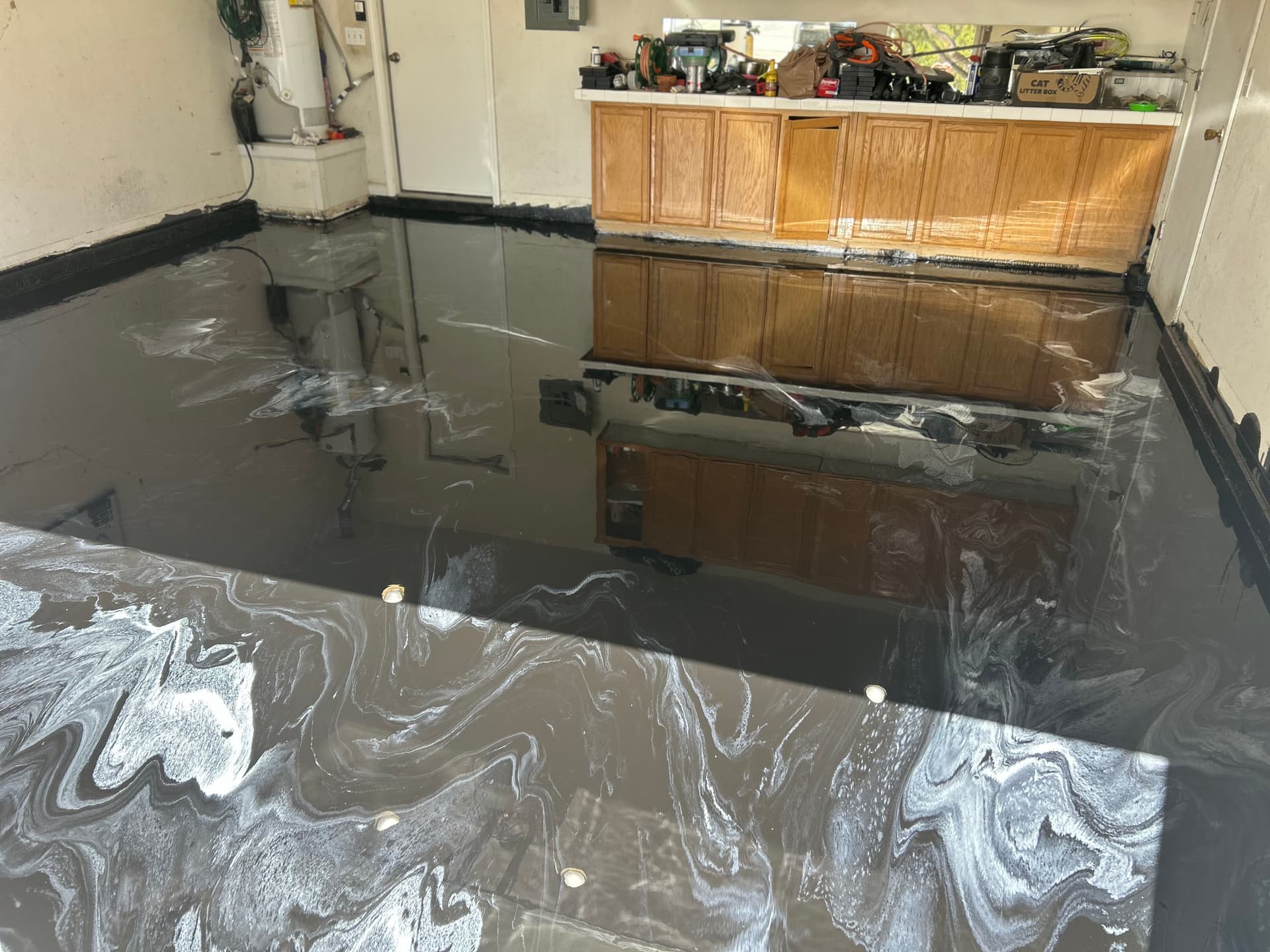Gallery photos for Black and White Custom Epoxy Metallic Garage Floor: Image #5