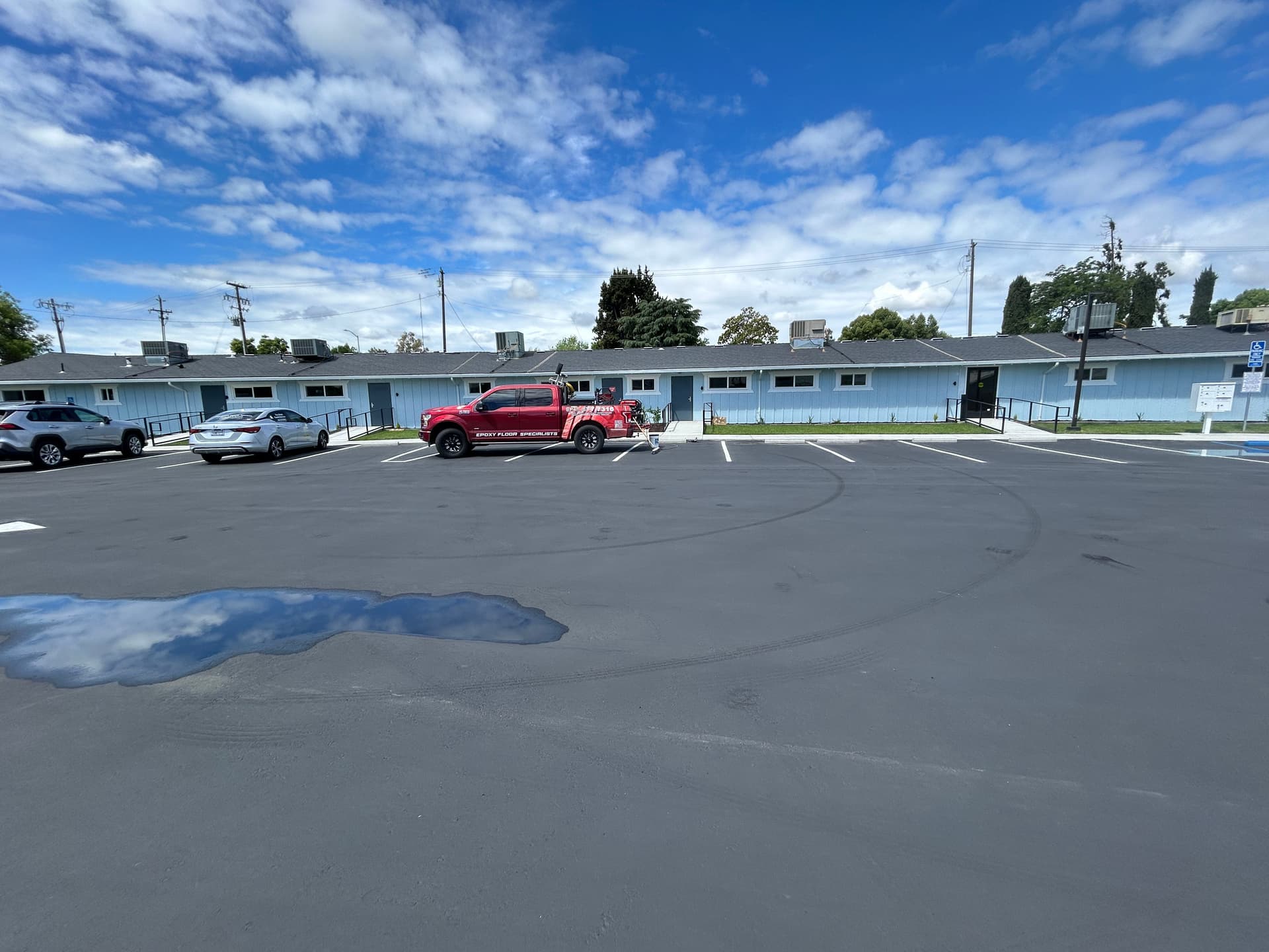Concrete Walkway Cleaning and Sealing at a Multi-Unit Property image