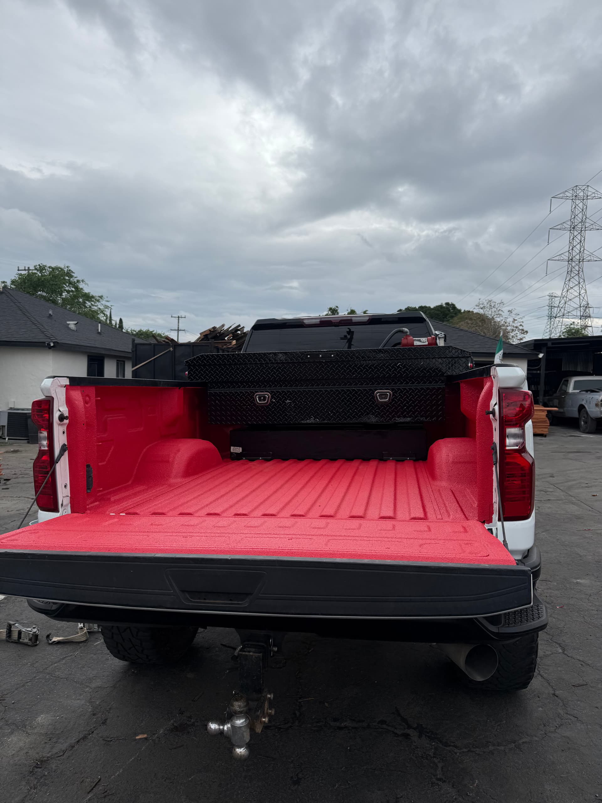 Gallery photos for Custom Red Pigmented Bedliner on a Chevy 2500 HD: Image #2