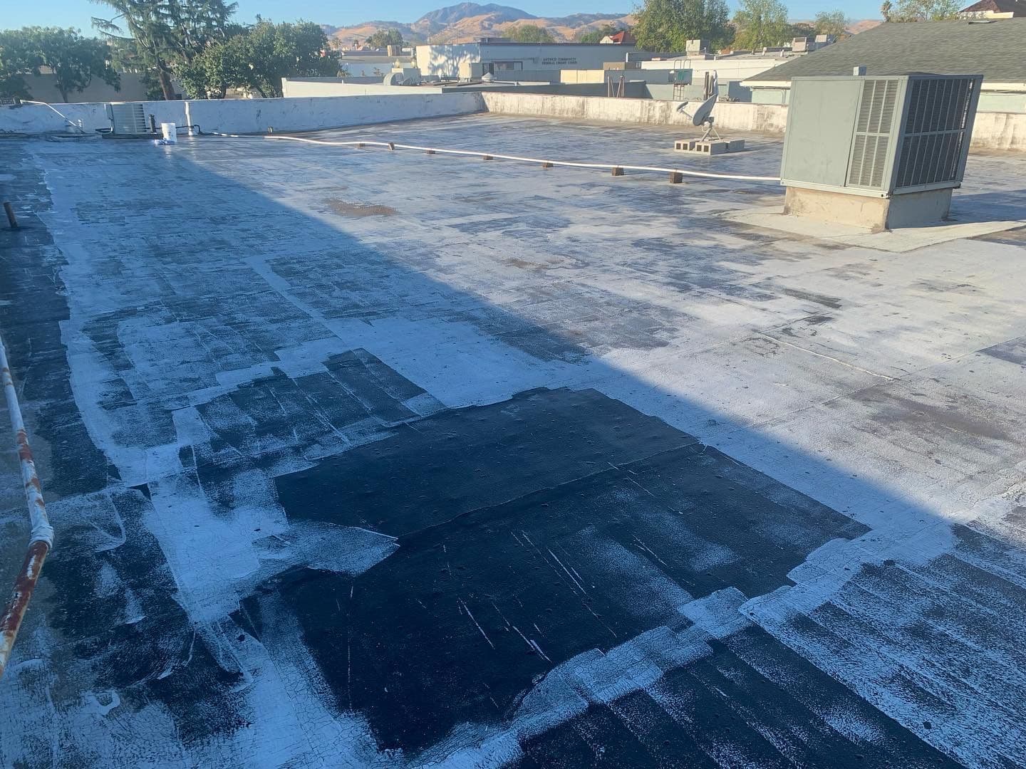Flat Roof Sealed With Elastomeric Coating for Lasting Protection image