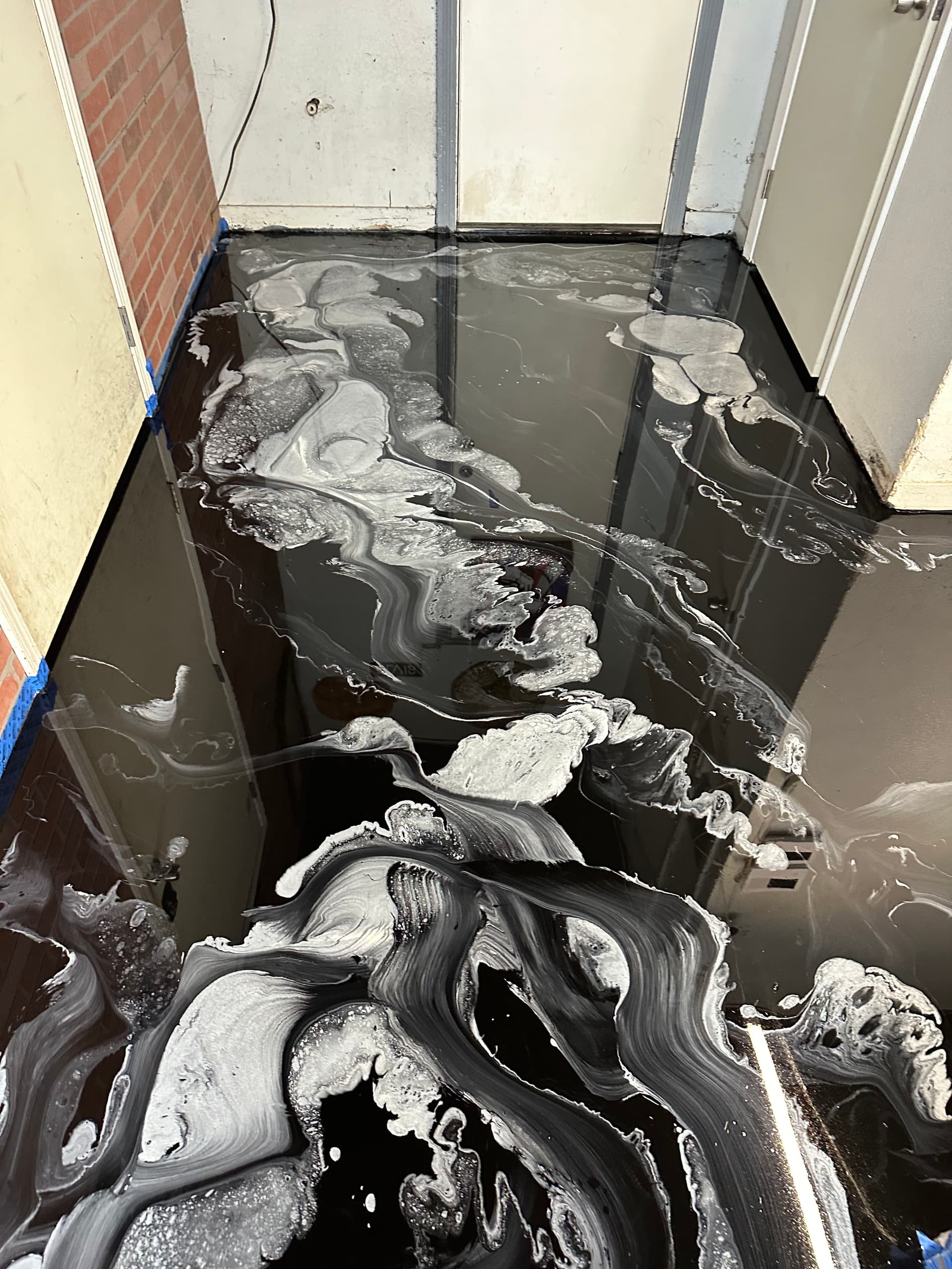 Gallery photos for Custom Epoxy Metallic Floor Installation at Smiley's Barbershop: Image #2