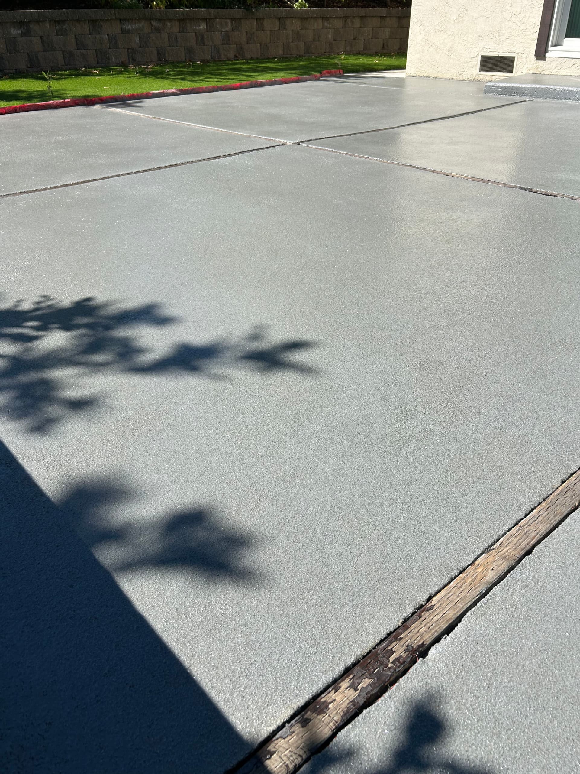 Gallery photos for Backyard Patio Gets a Sand Coating Epoxy and Poly Double Broadcast Finish: Image #1