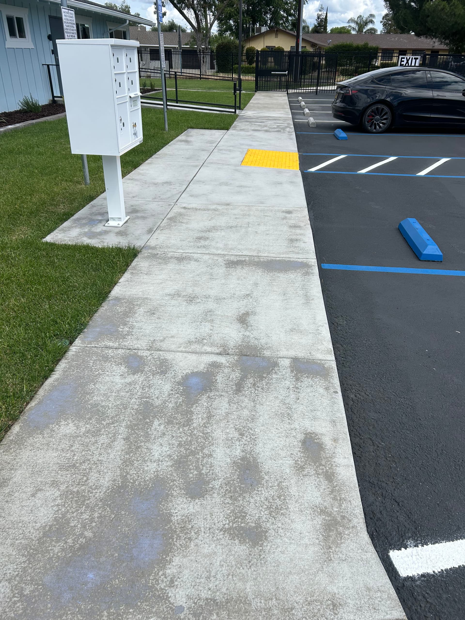 Gallery photos for Concrete Walkway Cleaning and Sealing at a Multi-Unit Property: Image #3