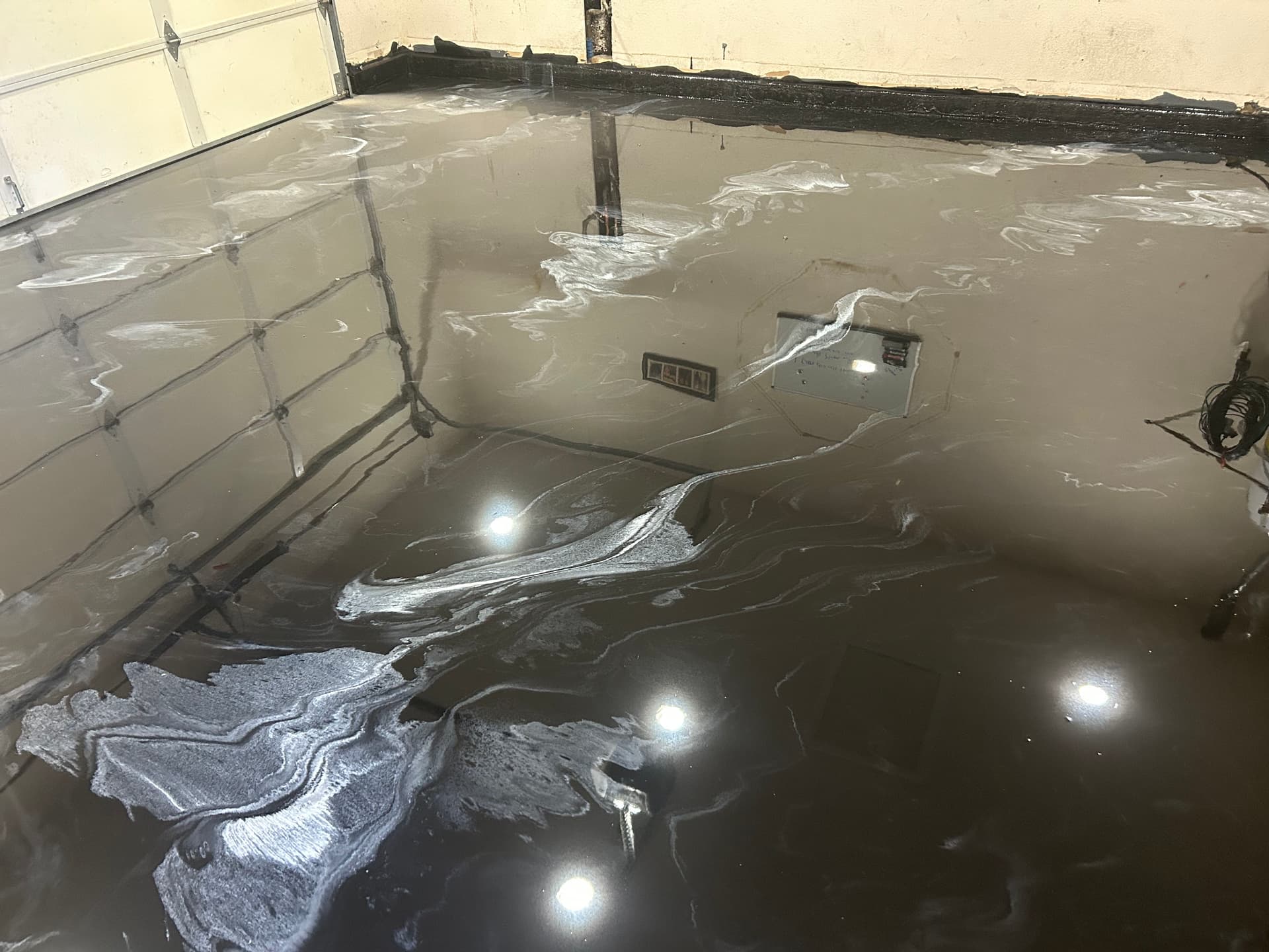 Gallery photos for Black and White Custom Epoxy Metallic Garage Floor: Image #8