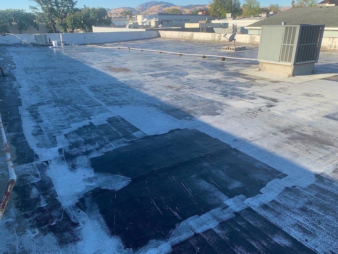 Gallery photos for Flat Roof Sealed With Elastomeric Coating for Lasting Protection: Image #1